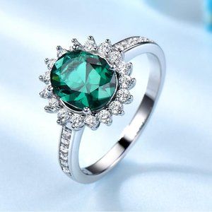 EMERALD GREEN OVAL 7 X 9 CUBIC ZIRCONIA RING